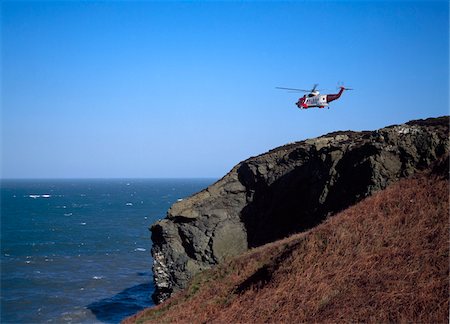 simsearch:400-05888607,k - Howth Head, Co Dublin, Ireland; Air-Sea rescue helicopter flying over Howth Head Foto de stock - Direito Controlado, Número: 832-03233509