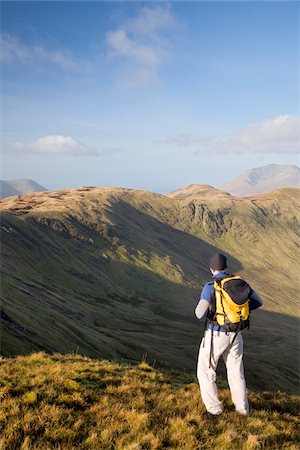 Leenaun Hill, Co Galway, Ireland; Hill walker looking across the mountains of Connemara Stock Photo - Rights-Managed, Code: 832-03233711