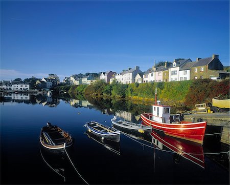 Boats moored at a harbor, Roundstone Harbor, Connemara, County Galway, Republic Of Ireland Stock Photo - Rights-Managed, Code: 832-03358573