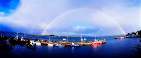 Rainbow over harbour, Roundstone, Ireland Stock Photo - Rights-Managed, Code: 832-03358792