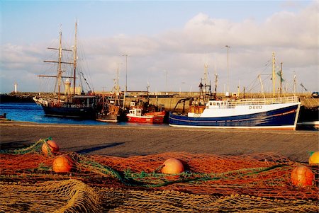 simsearch:832-03359160,k - Howth, County Dublin, Ireland; Pier with fishing boats and nets Foto de stock - Con derechos protegidos, Código: 832-03359135