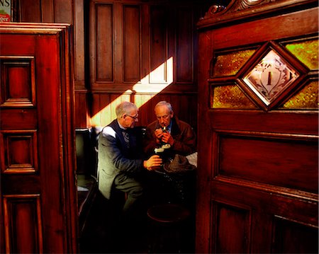 pipe smoking - Morrisey's Pub, Belfast, Ireland Stock Photo - Rights-Managed, Code: 832-03639805