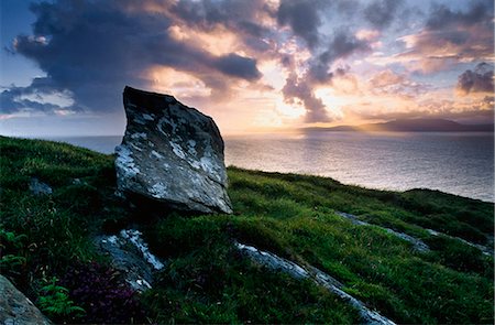 sunrise over water - Sunset Over Rocky Shoreline Stock Photo - Rights-Managed, Code: 832-03640315