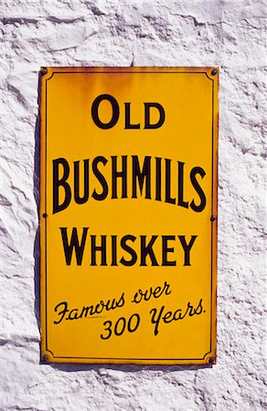 stucco sign - Sign Advertising Whiskey Stock Photo - Rights-Managed, Code: 832-03640311