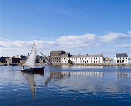 simsearch:6118-07352544,k - Man Sailing Sailboat On Harbour Stock Photo - Rights-Managed, Code: 832-03640560