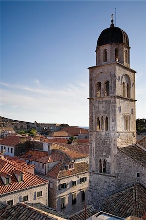 Tower of Saint Saviours church and rooftops. Foto de stock - Con derechos protegidos, Código: 832-03724031