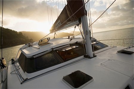 Voilier au coucher du soleil des îles Whitsunday Photographie de stock - Rights-Managed, Code: 832-03724305