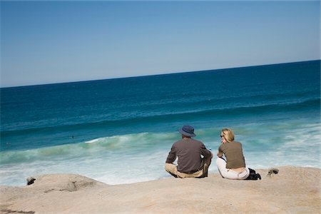 sit man backside view - Couple looking out over Mackensies Point near Bondi Beach Stock Photo - Rights-Managed, Code: 832-03724501
