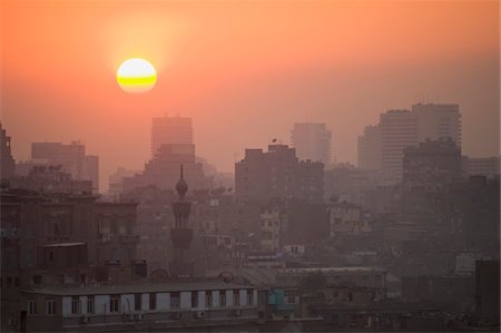 Minaret and blocks of flats at dusk Fotografie stock - Rights-Managed, Codice: 832-03724579