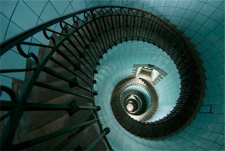 spiral staircase - Looking down the spiral staircase of the lighthouse Stock Photo - Rights-Managed, Code: 832-03724777