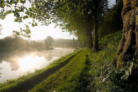 Looking along the Nantes-Brest canal on a misty morning Stock Photo - Rights-Managed, Code: 832-03724890