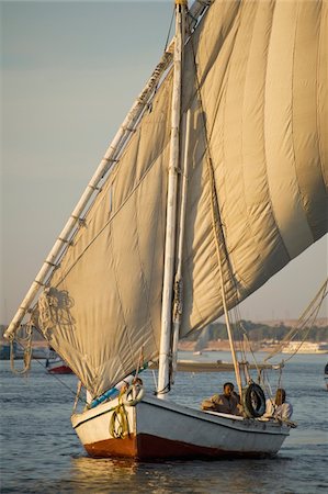 egyptian sailing on nile river - Felucca on River Nile at dusk Stock Photo - Rights-Managed, Code: 832-03724946