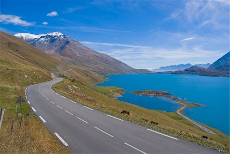 pavement lines - Empty bendy road by lake and Mont Cenis Stock Photo - Rights-Managed, Code: 832-03724973