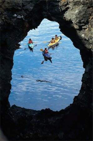 sports and kayaking - People sea kayaking at Hole in the Wall Stock Photo - Rights-Managed, Code: 832-03723750