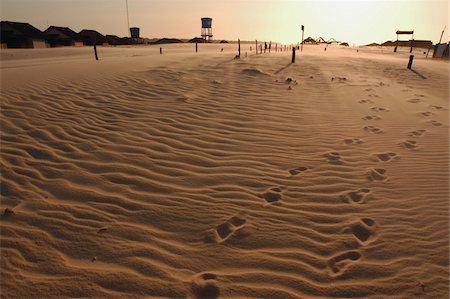 Footprints on sand at sunset Stock Photo - Rights-Managed, Code: 832-03723976