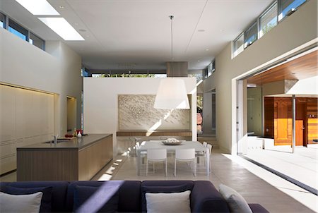 spacious rooms interior - Open plan dining area and kitchen in Menlo Park Residence, California, USA. Architects: Dumican Mosey Architects Stock Photo - Rights-Managed, Code: 845-05838198