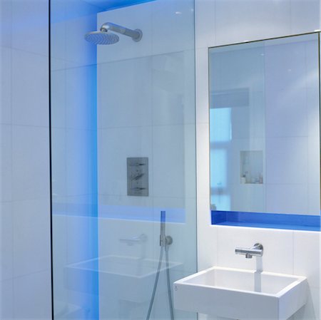 Square wall mounted washbasin next to shower cubicle in modern bathroom. Designed by Designed by Gustavo Hernandez Stock Photo - Rights-Managed, Code: 845-05838867