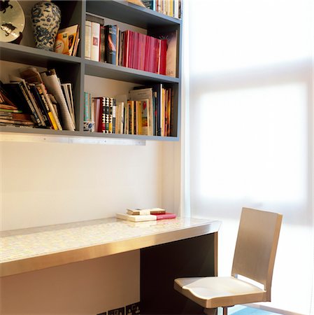 study (room) - Chair at fitted desk unit in modern room. Designed by Designed by Gustavo Hernandez Stock Photo - Rights-Managed, Code: 845-05838869