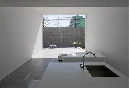 simsearch:845-05839500,k - MA-HOUSE, Private House, View of the living and dining room. Architects: Katsufumi Kubota, Kubota Architect Atelier Stock Photo - Rights-Managed, Code: 845-05839487