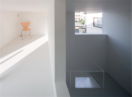 room with window frames - House T, Apartment House, Interior of apartment unit A on the 2nd mezzanine floor. Architects: Tsuyoshi Shindo, Be-Fun Design, Kenji Nawa, Nawakwnji-m Stock Photo - Rights-Managed, Code: 845-05839535