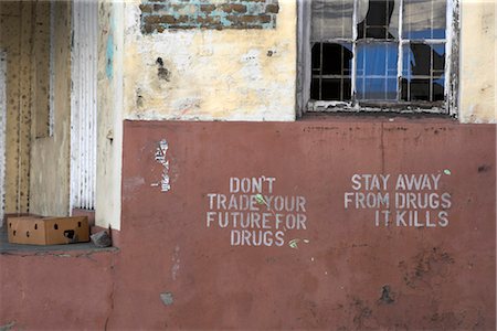 Broken window and warning against the use of drugs, Grenada, West Indies. Foto de stock - Direito Controlado, Número: 845-06008081