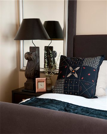 residential details - Embroidered cushion on bed in The Lakes, Cumbria, England, UK Stock Photo - Rights-Managed, Code: 845-06008492