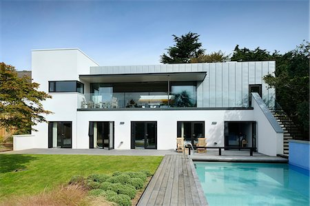 residential house pool - Exterior looking to the main house from the garden, Tresithney, Cornwall, UK. Architects: Architects: Stan Bolt Architect Stock Photo - Rights-Managed, Code: 845-07584988