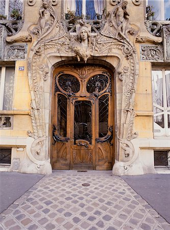 row houses france - 29 Avenue Rapp, Built in 1900, Entrance, Paris. Architect: Laviorette Stock Photo - Rights-Managed, Code: 845-02724762