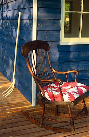porch rocking chairs - Rocking chair on verandah with folk cushion USA Stock Photo - Rights-Managed, Code: 845-02728989