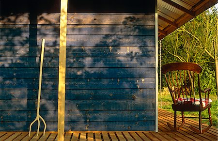 porch not people - Rocking chair on verandah with folk cushion USA Stock Photo - Rights-Managed, Code: 845-02728990