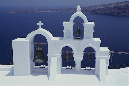 simsearch:400-04898640,k - Ioa, Santorini (Thira), Cyclades, Greece - church bell tower Foto de stock - Con derechos protegidos, Código: 845-02729365