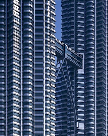 simsearch:400-08114490,k - Petronas  Twin Towers, Kuala Lumpur, 1998. Exterior detail with linking bridge.  452m high. Architect: Cesar Pelli Foto de stock - Con derechos protegidos, Código: 845-02729544