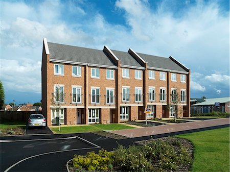 european houses terraces - Liberty Park, Coventry. New build housing estate by Wates Developments at Liberty Park in Coventry. This new estate is the regeneration of the Hillside Meadway area for Whitefriars Services Ltd.  Architects: Wates Developments Stock Photo - Rights-Managed, Code: 845-03553191