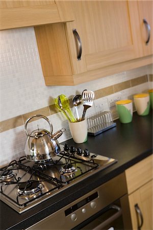 Four burner gas hob in with kettle. Architects: Spawforth Associates Stock Photo - Rights-Managed, Code: 845-03720465