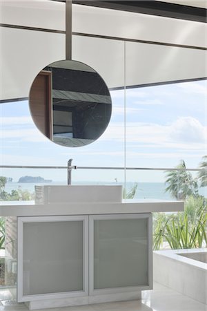 simsearch:845-03720882,k - Modern bathroom with round mirror and view from picture windows. Architects: Lim Cheng Kooi and AR43 Stock Photo - Rights-Managed, Code: 845-03720868