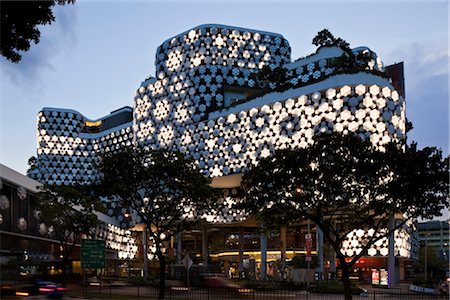 simsearch:845-03720882,k - Exterior of Iluma shopping and cinema complex in Sinagpore by WOHA. Facade lighting by realities united. Completed November 2009. Architects: WOHA Stock Photo - Rights-Managed, Code: 845-03720870