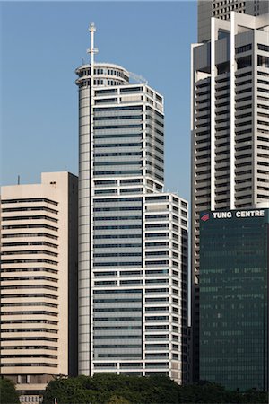 simsearch:845-03552709,k - The Hitachi Tower commercial building was designed by Murphy/Jahn and local firm Architects 61 Pte Ltd. It was completed in 1992. Architects: Murphy, Jahn and 61 Pte Ltd Stock Photo - Rights-Managed, Code: 845-03721315