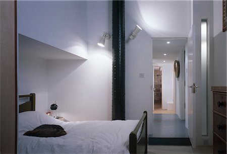 simsearch:845-05838842,k - Bedroom with spotlights. Architects: Gareth Hoskins. Designed by Designed by David Churchill, Phillipa Vafadari Foto de stock - Direito Controlado, Número: 845-03721516