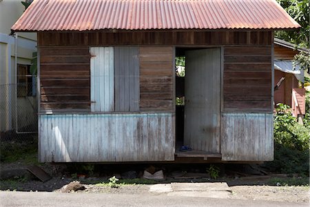 simsearch:845-03777440,k - Janet house, remaining temporary home with corrugated roof, supplied after hurricane Janet in 1955 Grenada Fotografie stock - Rights-Managed, Codice: 845-03777414