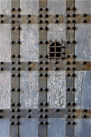 door design - Naples. Castel Sant'Elmo, studded wall with grid pattern and barred window Stock Photo - Rights-Managed, Code: 845-03777443