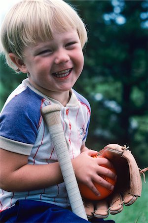 1970s - 1980s HAPPY SMILING BLOND BOY HOLDING BASEBALL BAT GLOVE BALL Stock Photo - Rights-Managed, Code: 846-05645678