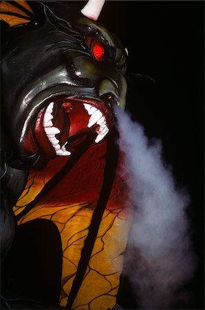 smoking and angry - 1990s AMUSEMENT PARK RIDE DEVIL WITH SMOKE COMING OUT OF NOSE Stock Photo - Rights-Managed, Code: 846-05645762