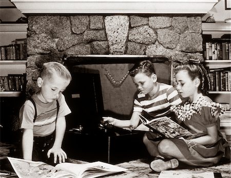 1950s CHILDREN PLAYING VINYL RECORDS AND READING BOOKS BY FIREPLACE Stock Photo - Rights-Managed, Code: 846-05645910