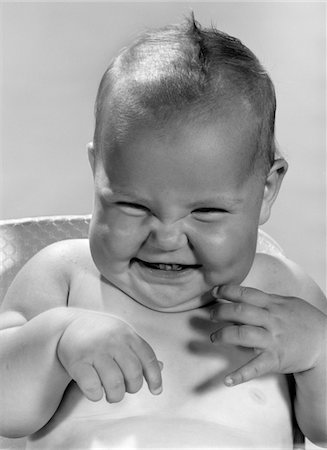 simsearch:846-03163865,k - 1960s PORTRAIT OF SMILING BABY INDOOR MAKING A FUNNY FACE Stock Photo - Rights-Managed, Code: 846-05645999