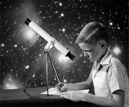 simsearch:632-01156895,k - 1960s BOY SITTING AT TABLE WITH TELESCOPE & STARS IN BACKGROUND WRITING IN NOTEBOOK Stock Photo - Rights-Managed, Code: 846-05646056