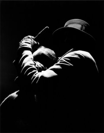 dangerous behind - 1950s MAN CRIMINAL ATTACKING MALE VICTIM FROM BEHIND USING HEADLOCK AND BATON Stock Photo - Rights-Managed, Code: 846-05646187