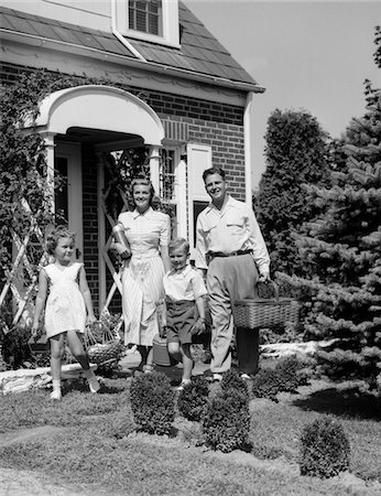 family outside new home - 1940s - 1950s FAMILY OF FOUR WALKING OUT OF HOUSE CARRYING PICNIC BASKETS THERMOS & JUG Stock Photo - Rights-Managed, Code: 846-05646225