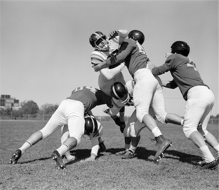 1960s SIX MEN PLAYING FOOTBALL GROUP TACKLE Stock Photo - Rights-Managed, Code: 846-05646317