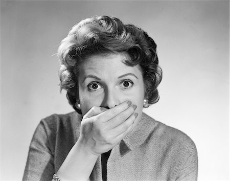 family scared - 1950s HEAD SHOT OF STARTLED WOMAN COVERING MOUTH WITH HAND Stock Photo - Rights-Managed, Code: 846-05646407