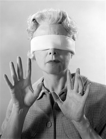 simsearch:846-06112465,k - 1960s ELDERLY WOMAN WEARING BLINDFOLD HOLDING UP HER HANDS Stock Photo - Rights-Managed, Code: 846-05646430